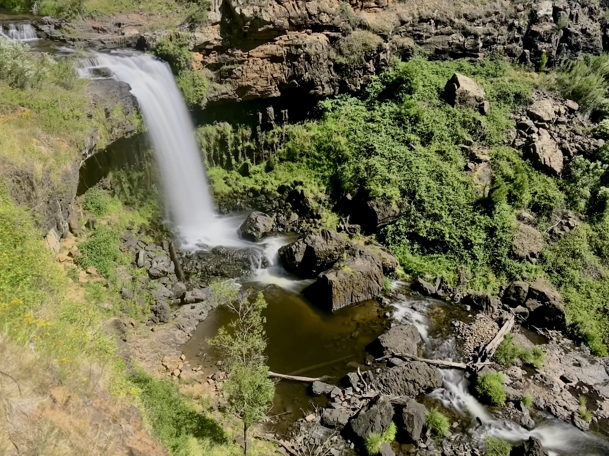 A waterfall plunging into a gorge