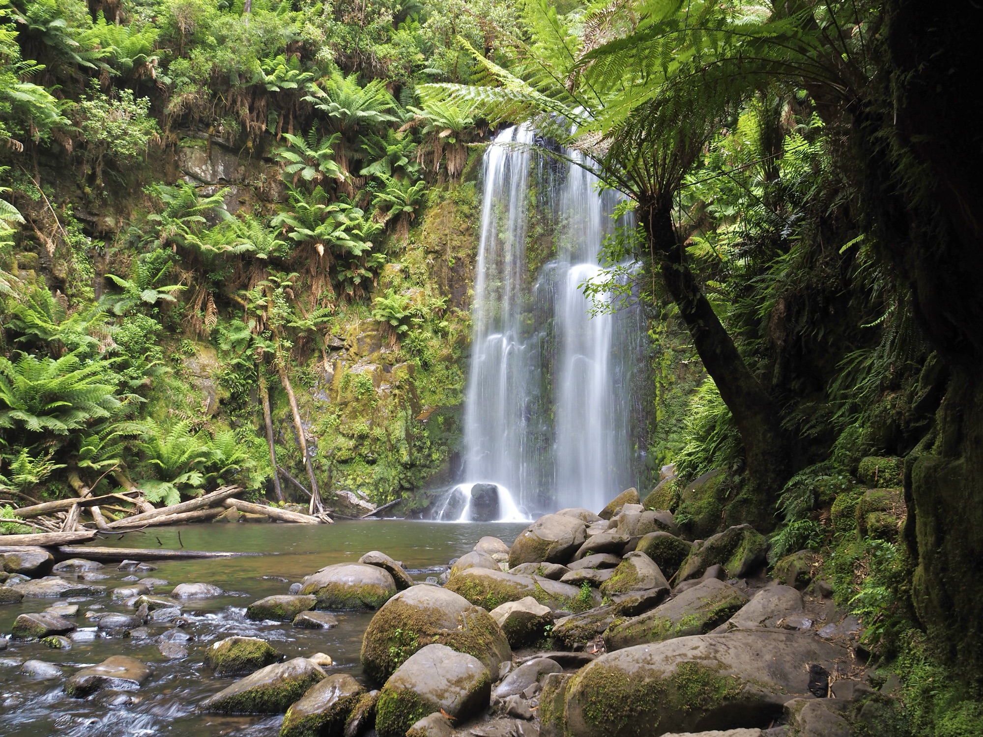 A view at the base of some lovely waterfalls 
